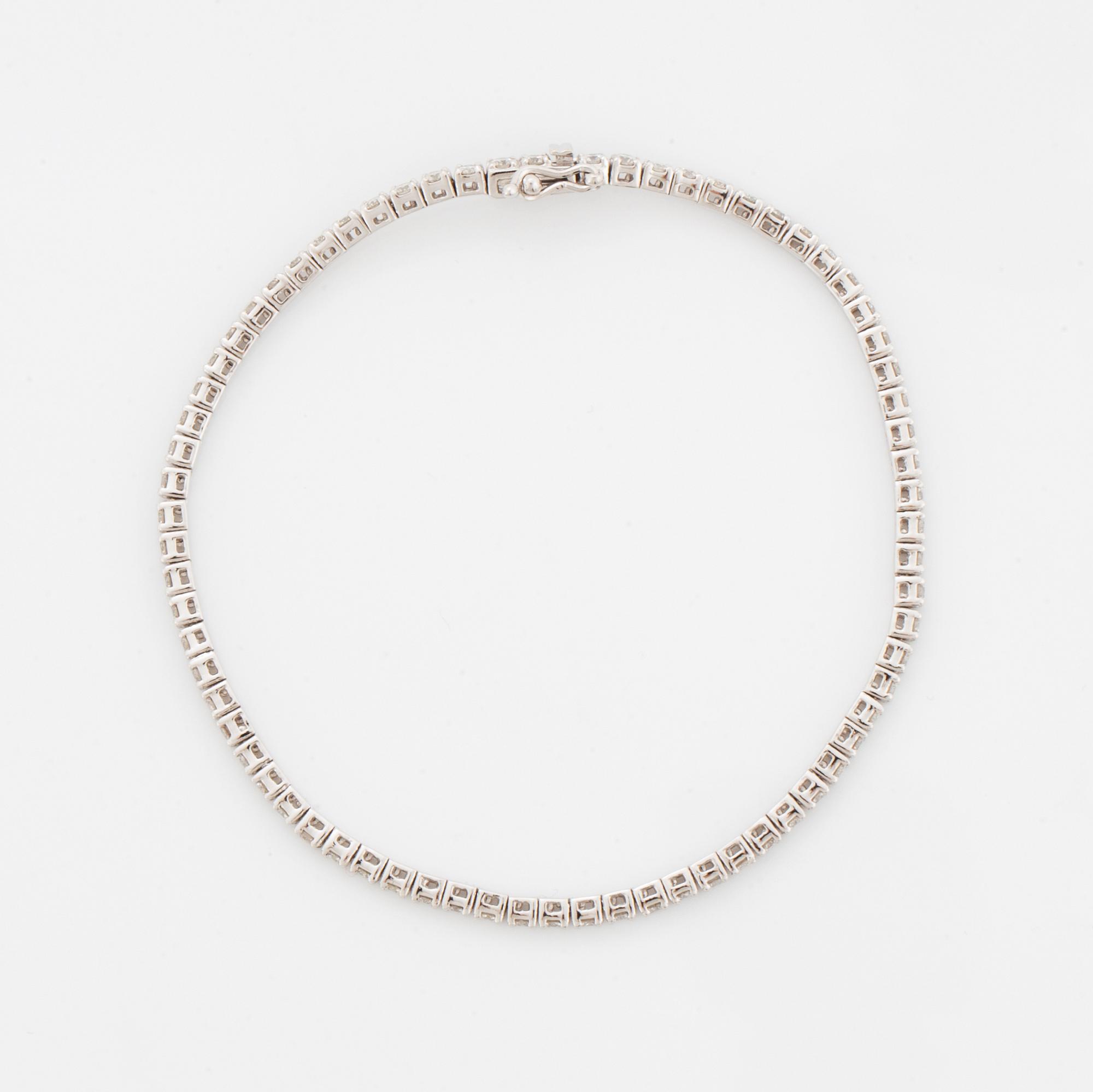 Brilliant-cut diamond tennis bracelet, with report W.G.I.