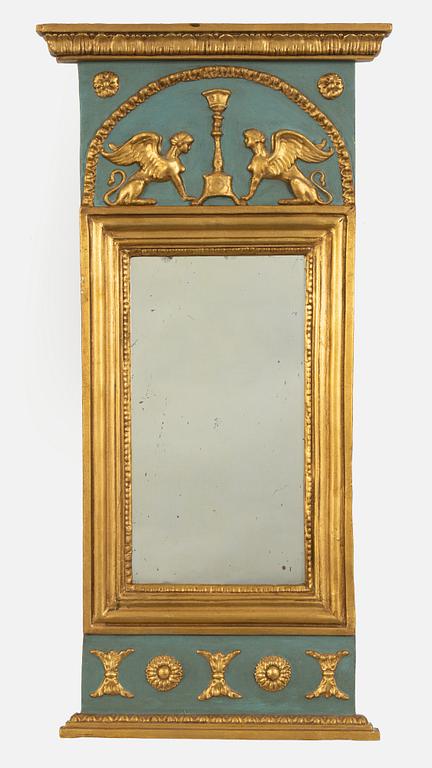 A Swedish giltwood empire mirror, first part of the 19th century.