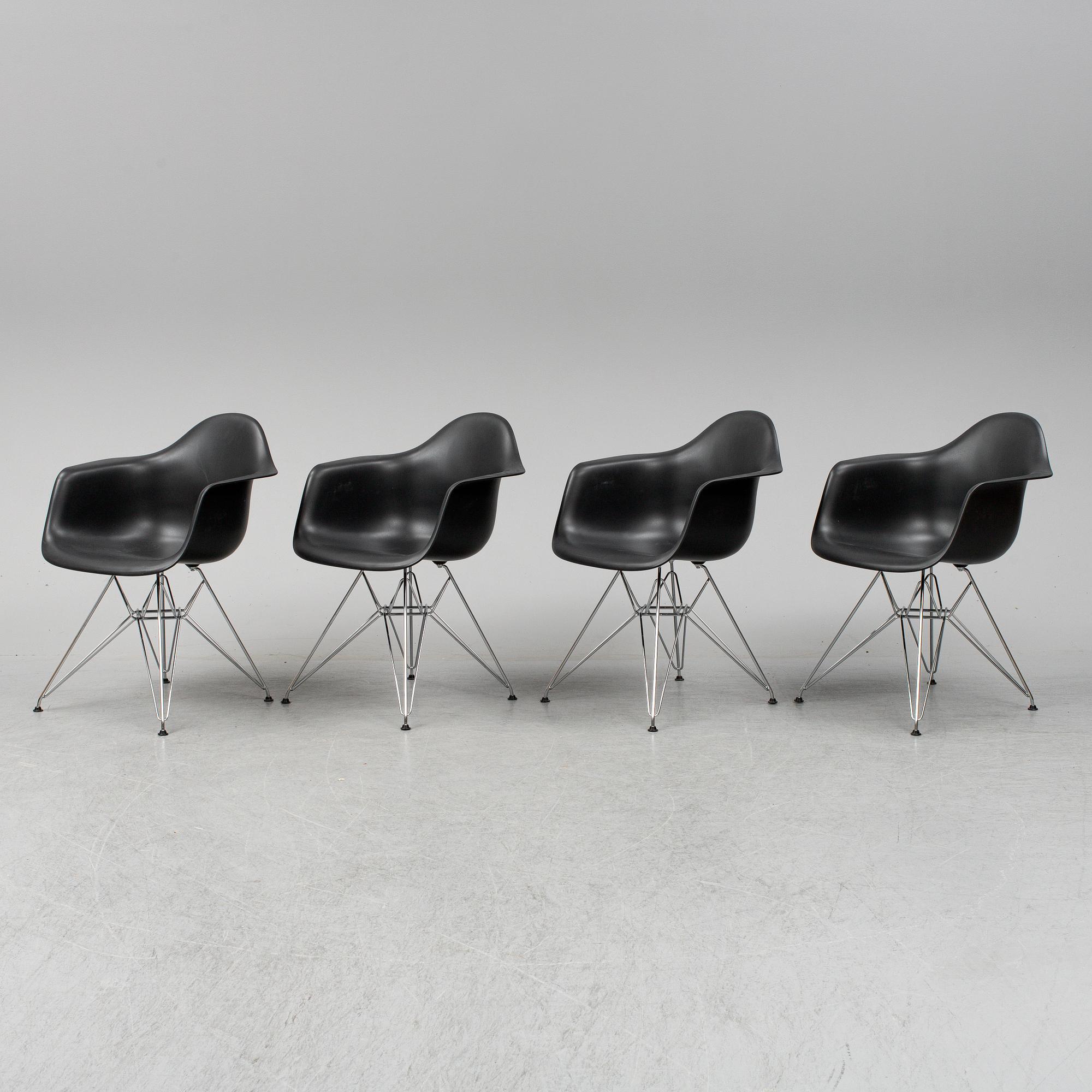 CHARLES AND RAY EAMES,  4  Eames Plastic Armchair, Vitra 2010.