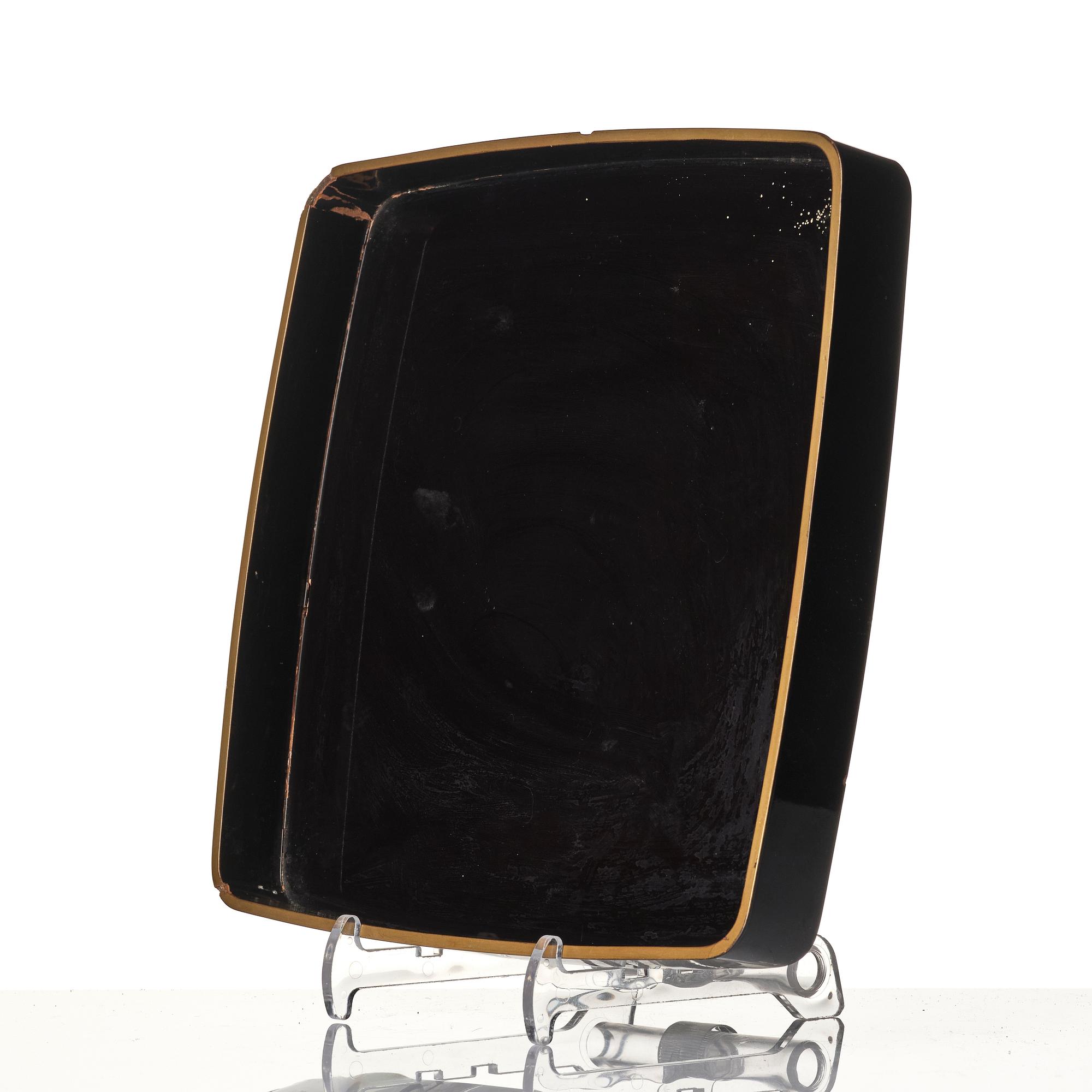 A Japanese lacquer tray and three Japanse wooden boxes.