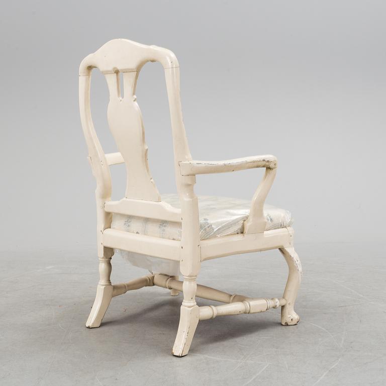 An early 18th century rococo chair.