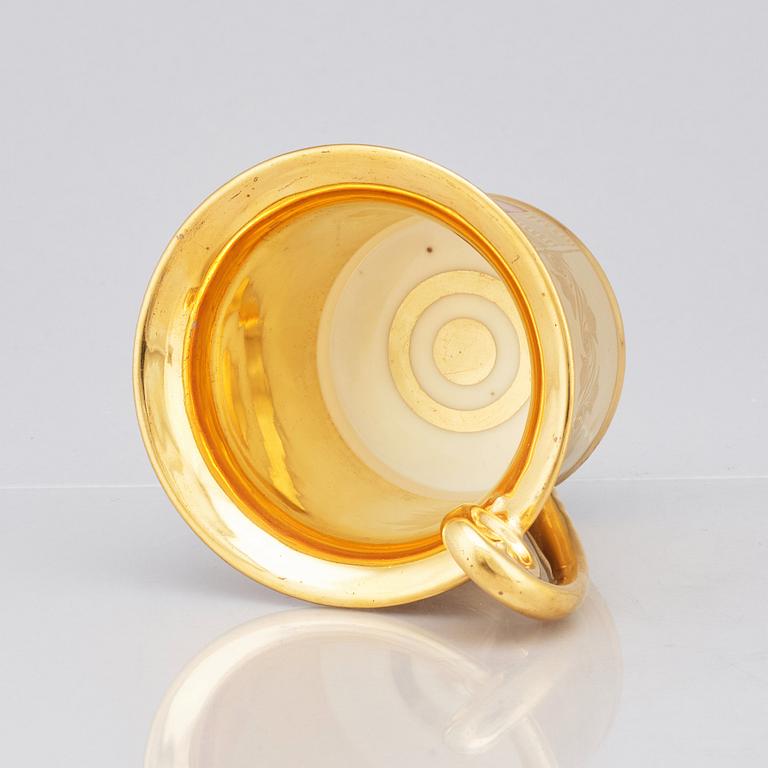 A German topographical cup with stand, 19th Century.