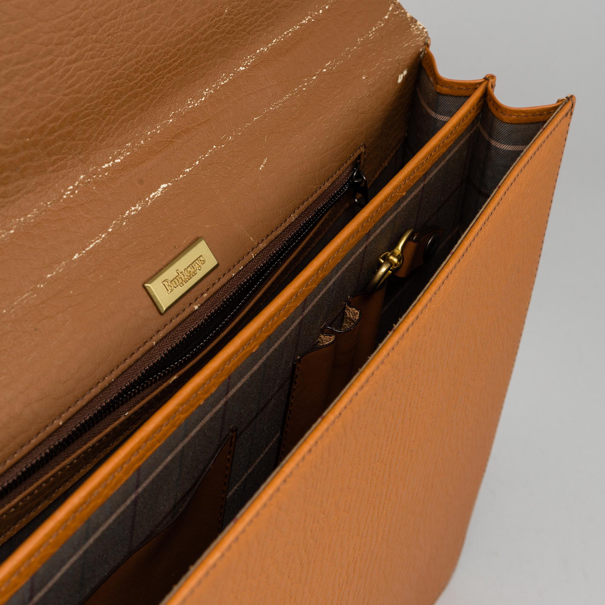 BURBERRY, a briefcase.