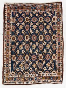 A Veramin rug, c. 140 x 105 cm.