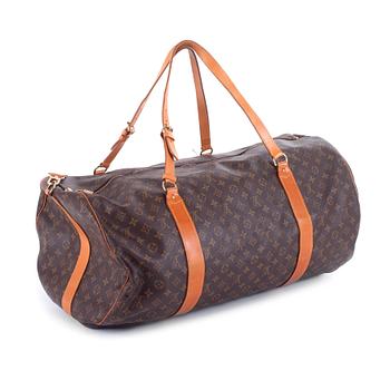 LOUIS VUITTON, a monogram canvas travelling bag "Polochon".