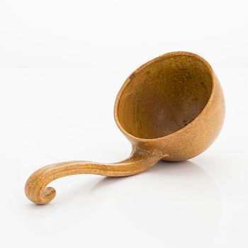Kyllikki Salmenhaara, a stoneware stainer ladle, signed KS.