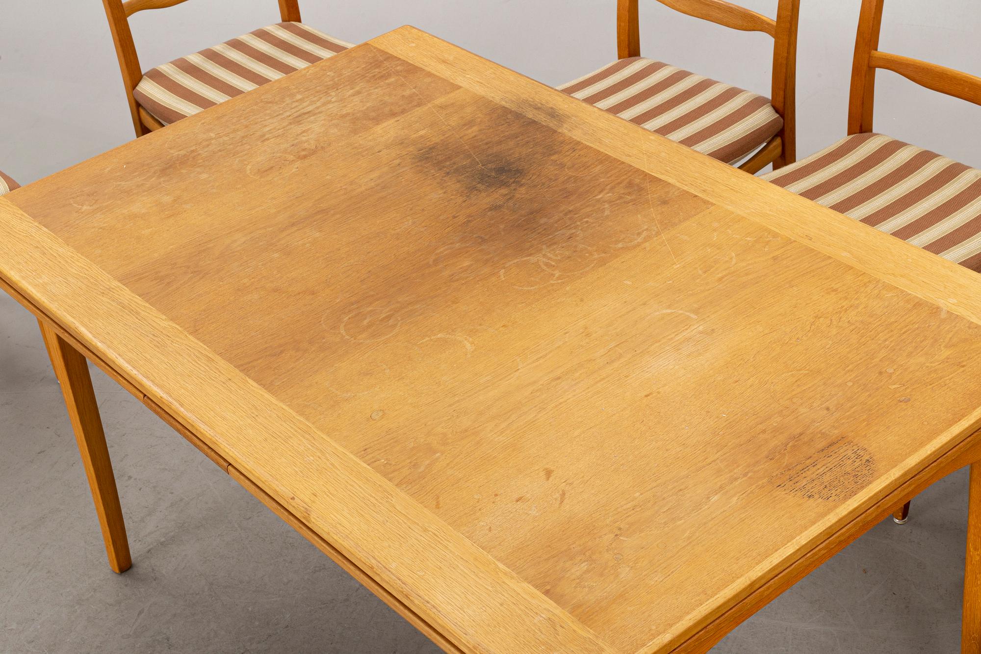 A CARL MALMSTEN DINING TABLE and CHAIRS, 7 parts.