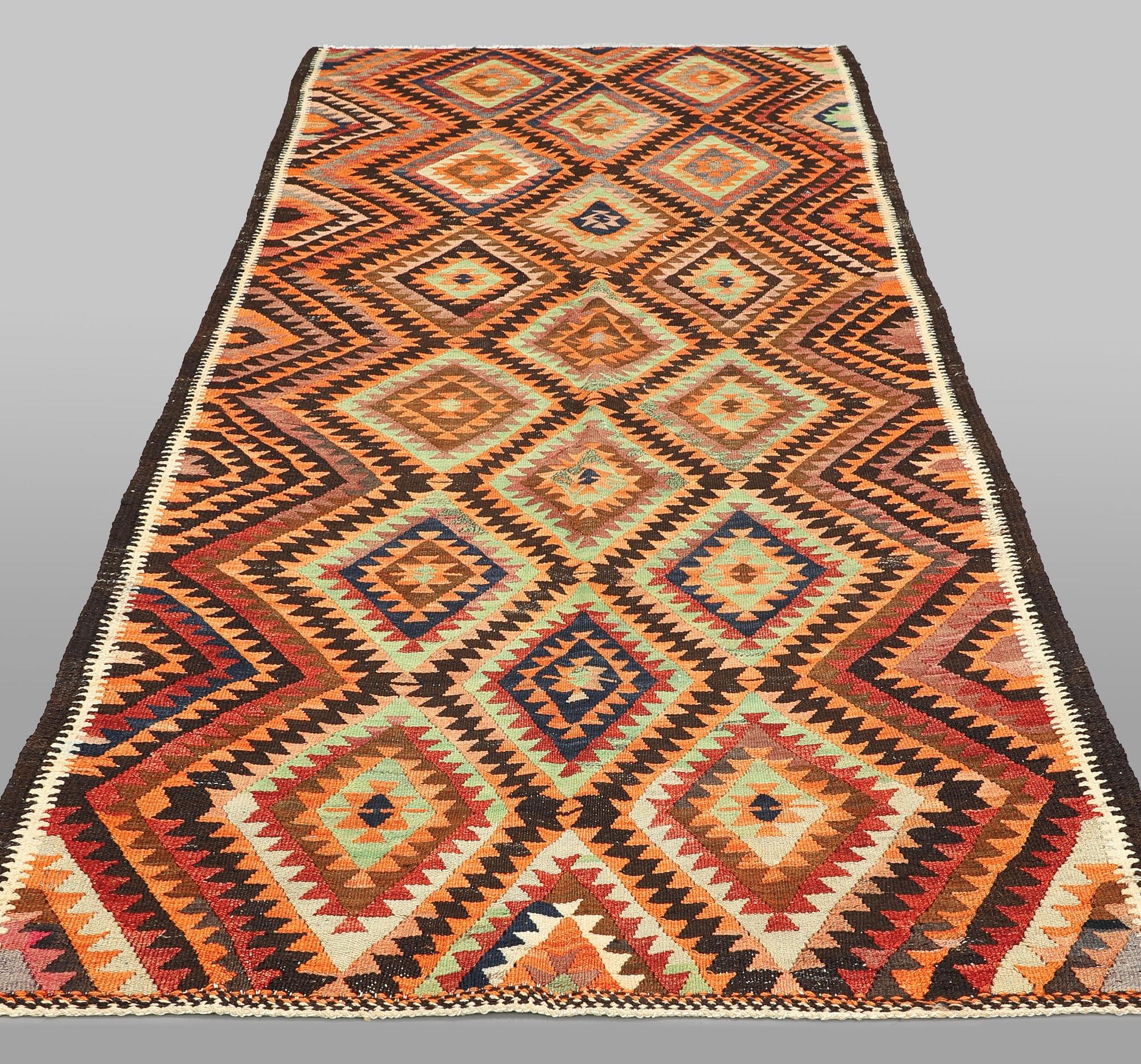 A  Persian nomadic Kilim rug, approx. 300 x 143 cm.