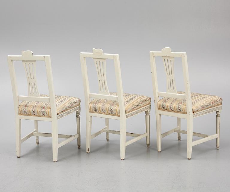 A sofa, three chairs and a table, Gustaivan style and of the Gustavian period, 19th-20th century.