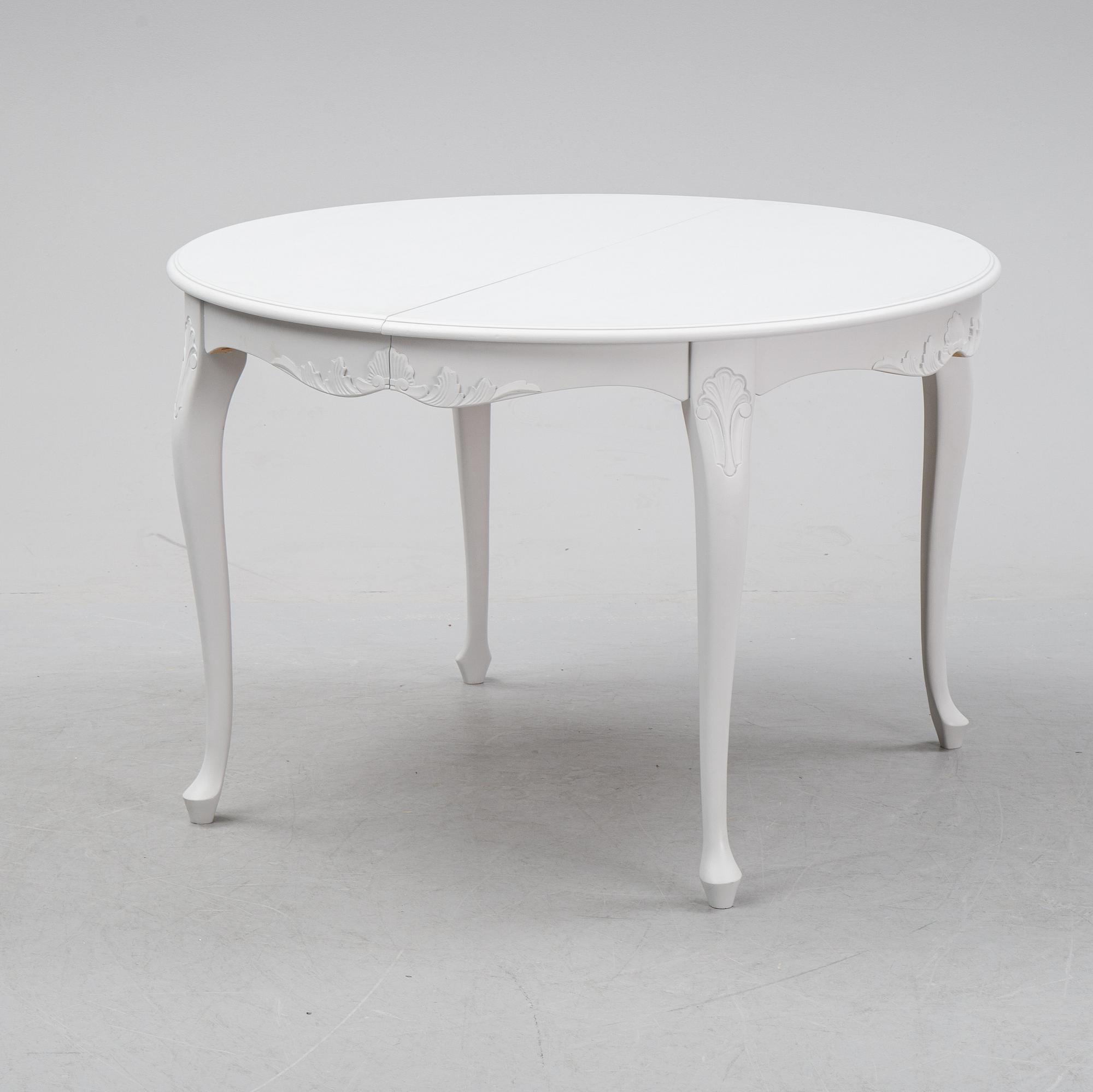 A painted Rococo style dining table, second half of teh 20th century.