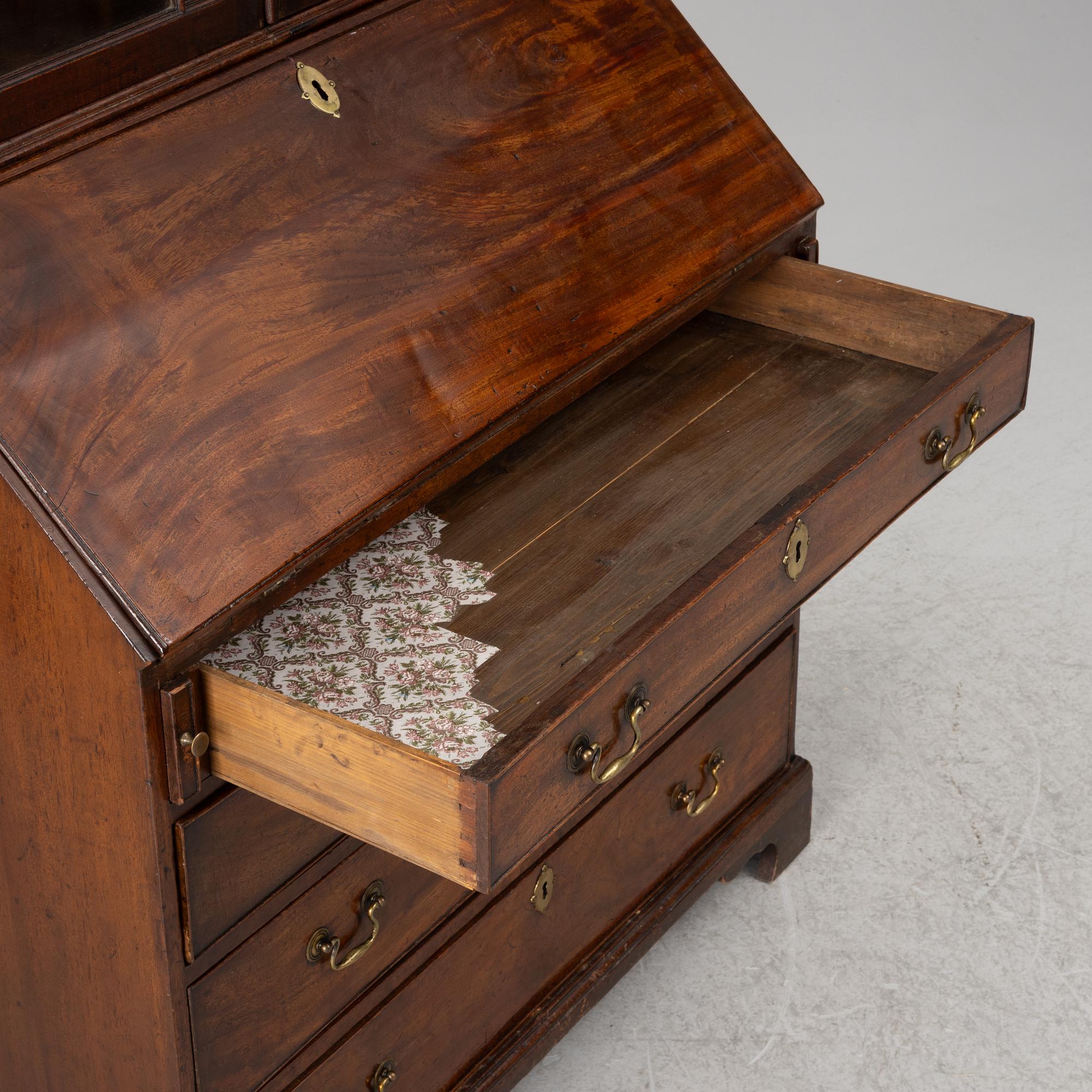 An English mahogany cabinet, 19th Century.