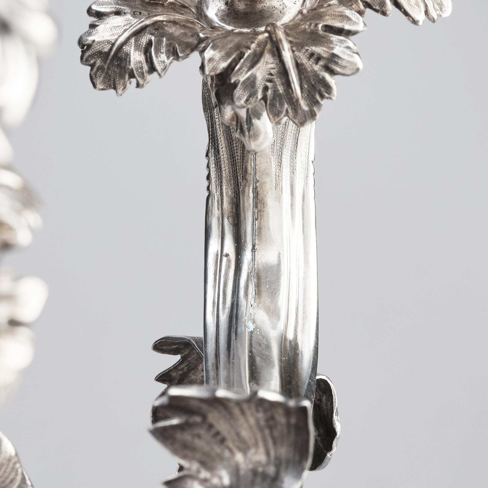 A pair of Swedish silver candelabra, mark of Gustaf Möllenborg-Féron, Stockholm 1856.