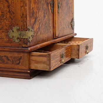 A late Baroque wall cabinet with shelves, first half of the 18th century.