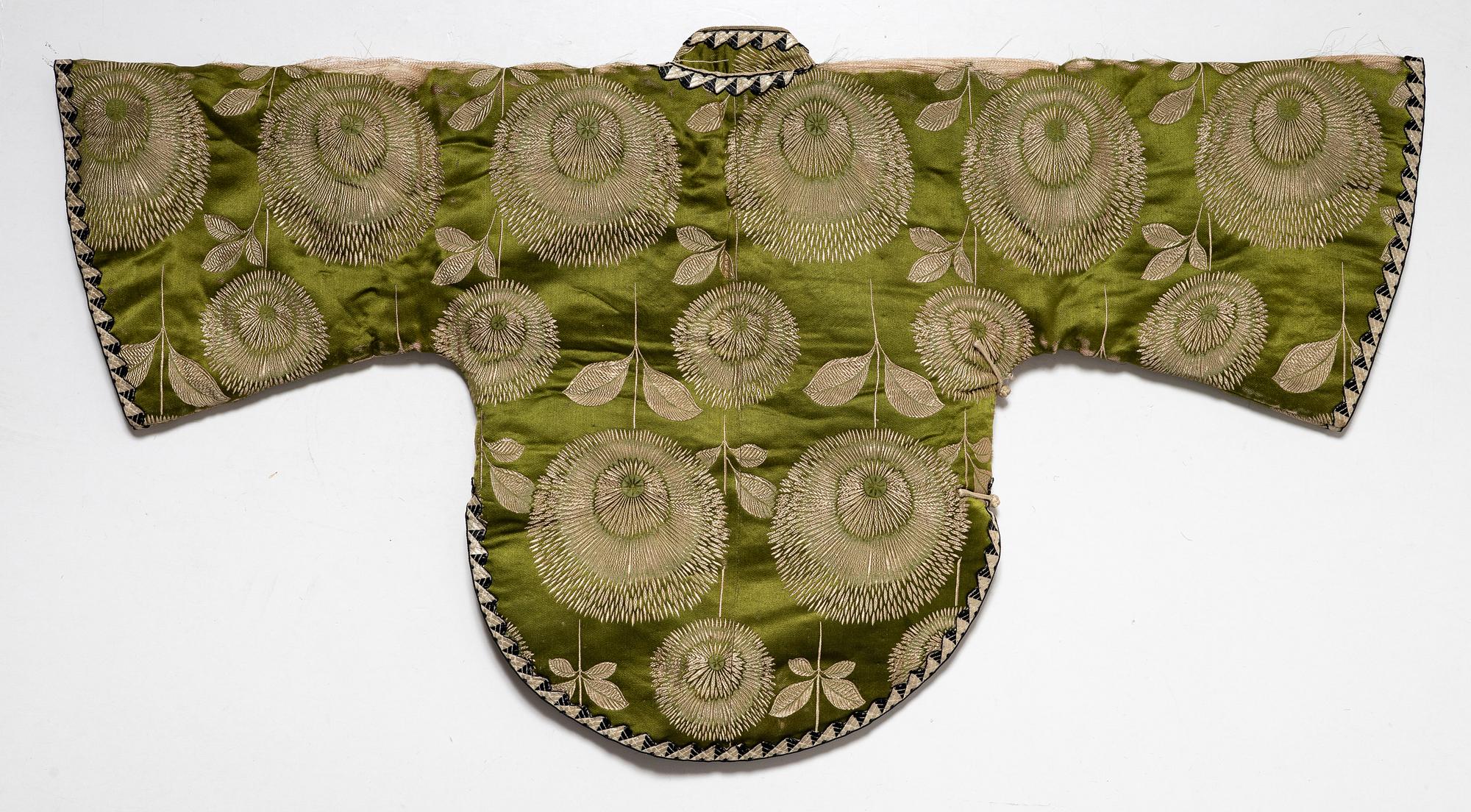 A Japanese silk brocade and fur childrens jacket, Meiji (1868-1912).