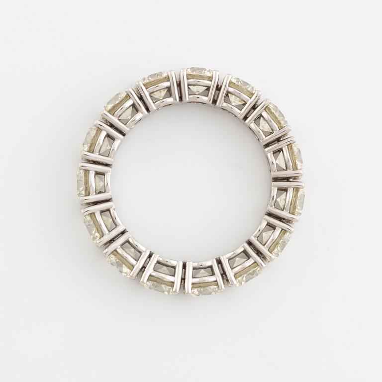 Brilliant cut diamond eternity ring.