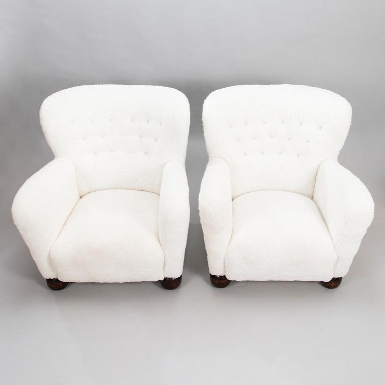 A pair of 1940's armchairs.