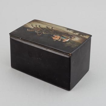 A lacquered lidded box, Russia, 1870s.