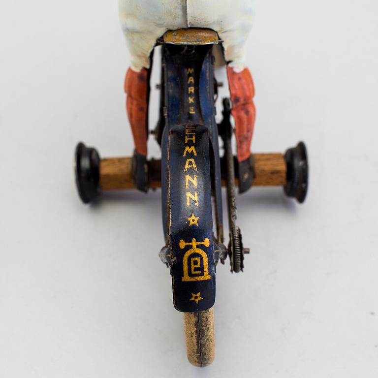 A partially hand painted tinplate Lehmann Halloh motorcycle, Germany. In production 1914-41.
