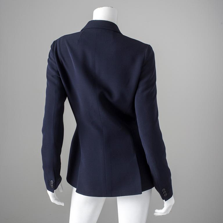 A darkblue jacket by Christian Dior.