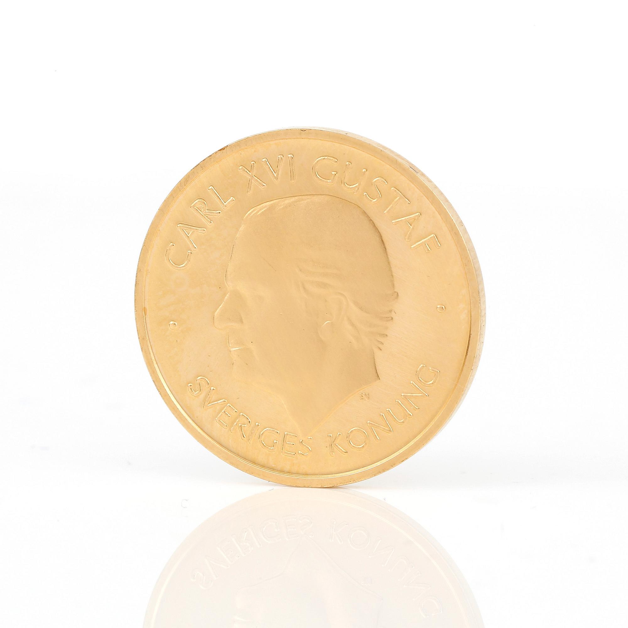 GULDMYNT, jubileum, 1000 kronor, 18 karat guld. Kalmarunionen 1397-1997. Vikt 5,8 gram.