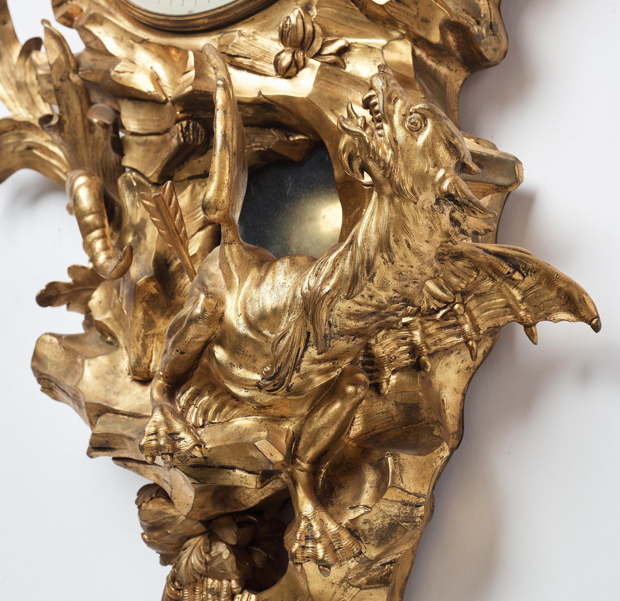 A Louis XV mid 18th century gilt bronze wall clock marked "Caffieri fecit".