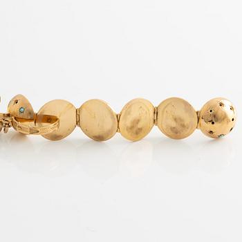Bracelet, 18K gold with two large charms.