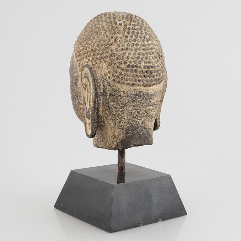 A Buddha's head, stone. Ming style.