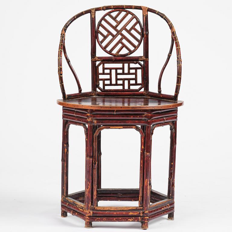 A Chinese bamboo horseshoeback armchair, late Qing dynasty.