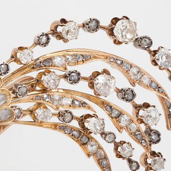 BROSCH, "Paradisfågel" med gammal- samt rosenslipade diamanter, safirer och rubiner.