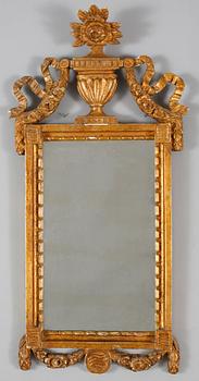 A mirror in gustavian style, made around year 1900.