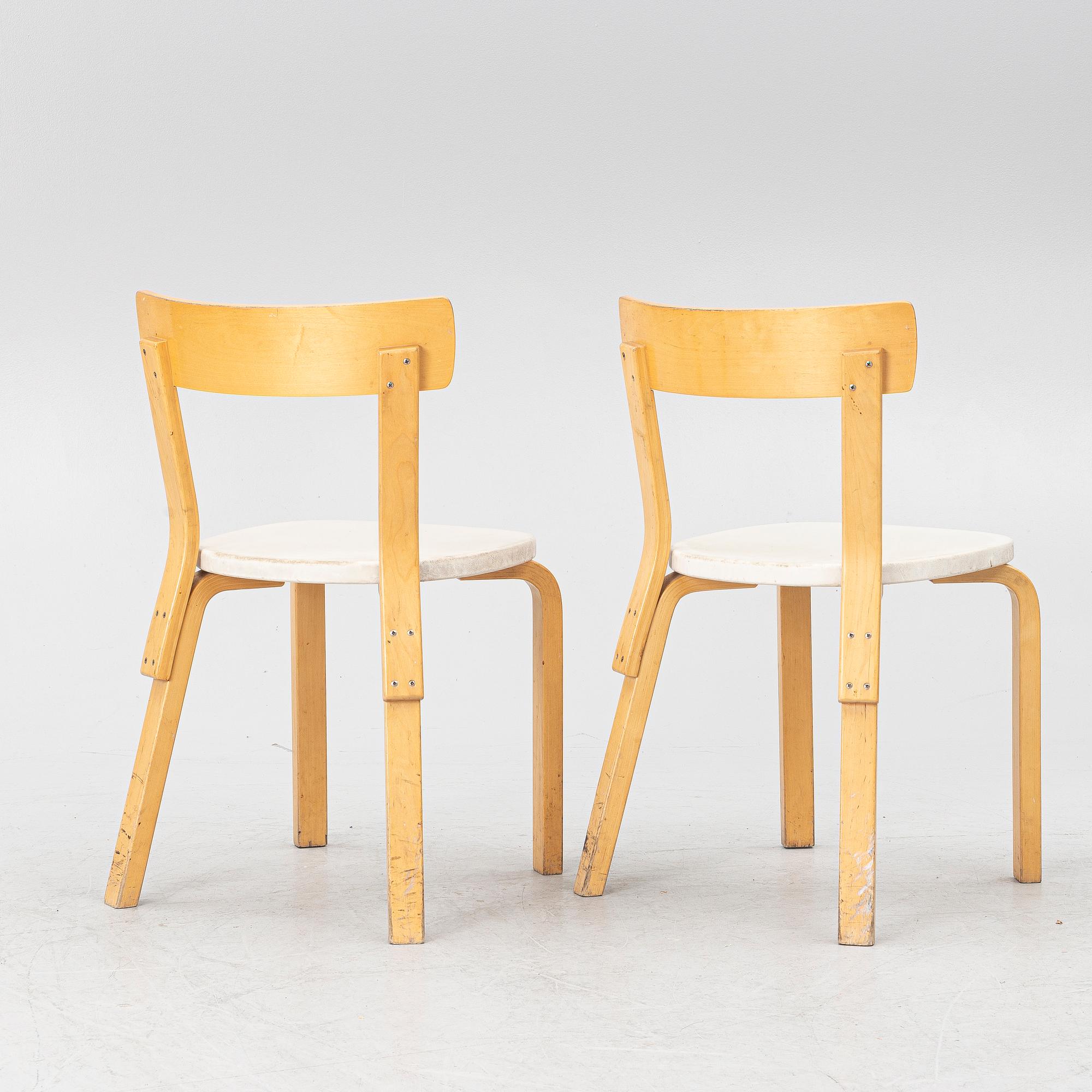 Alvar Aalto, a pair of model 69 chairs, Finland, second half of the 20th century.