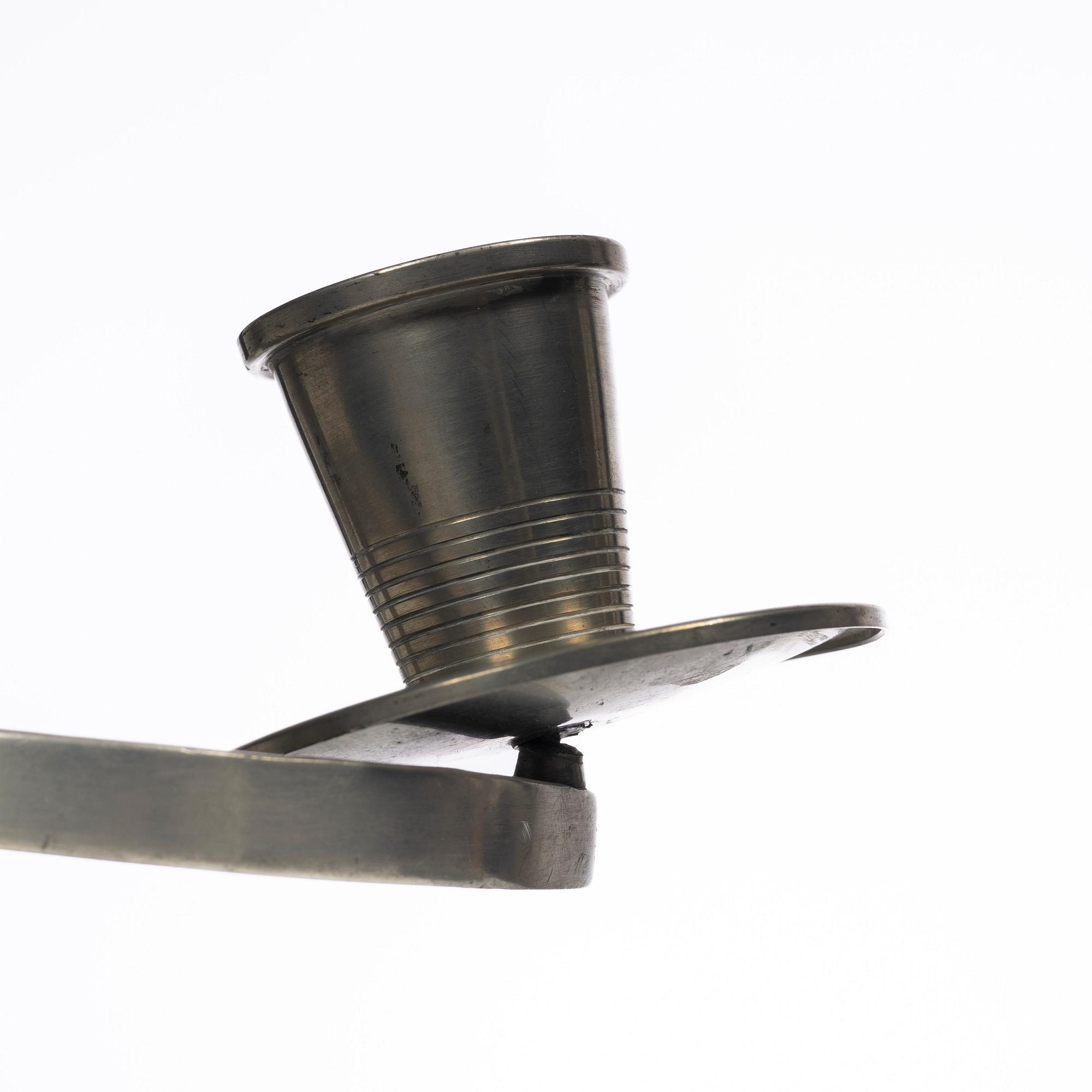 Nils Fougstedt, A pair of candelabra, FAK (Fabriksaktiebolaget Kronsilver), Stockholm, 1934.