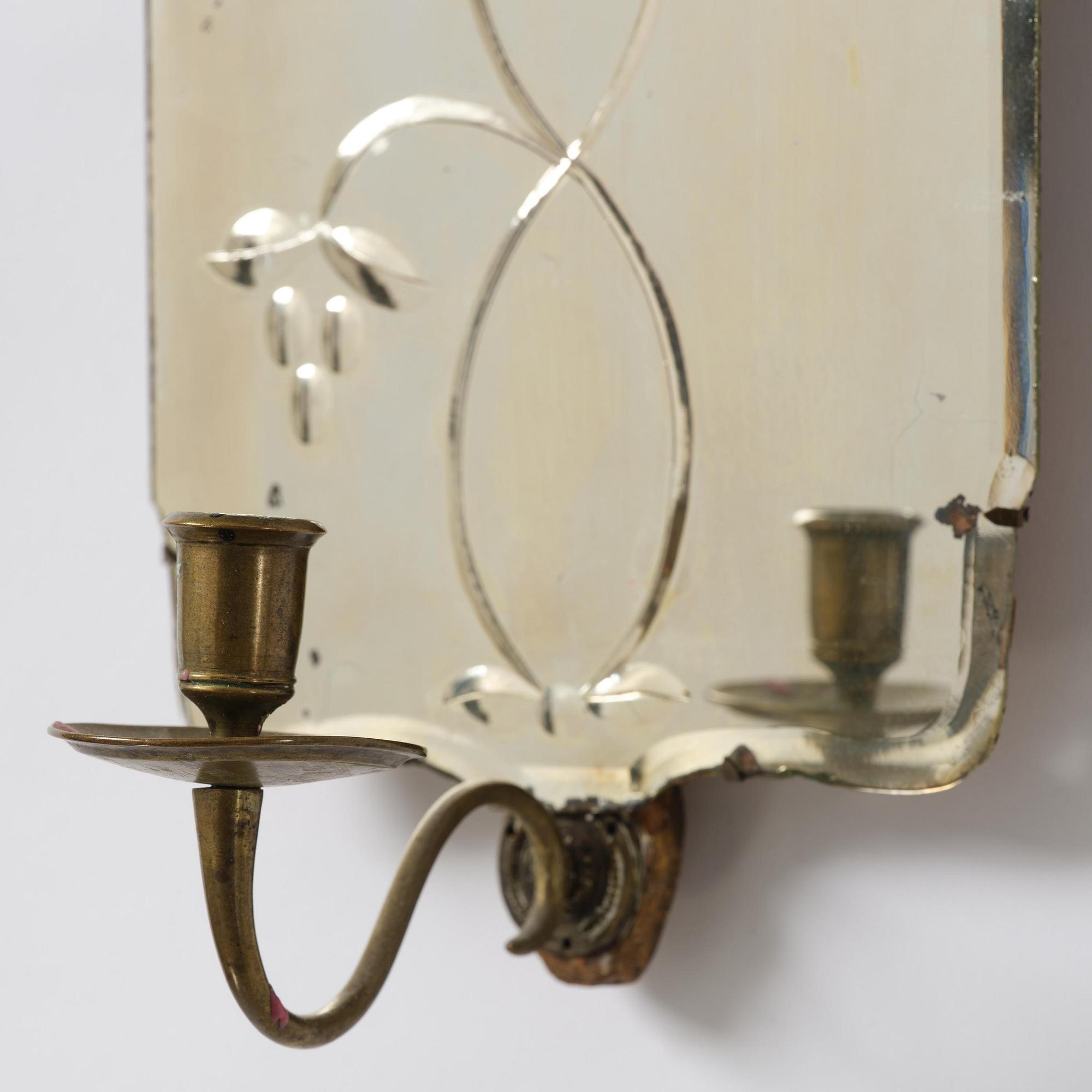 A pair of Swedish engraved-glass one-branch girandole mirrors, later part 18th century.