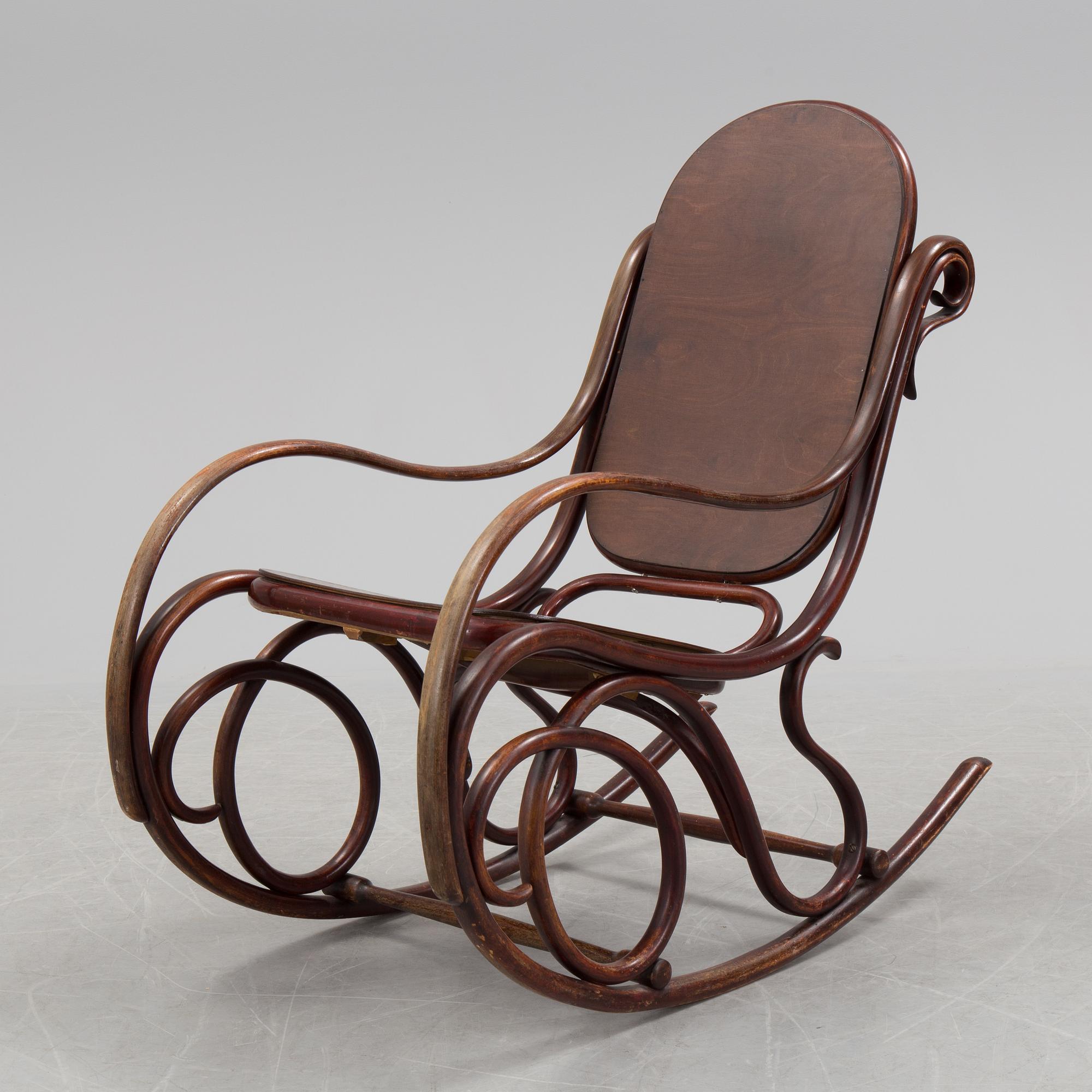 A stained rocking chair by Thonet, about 1900.