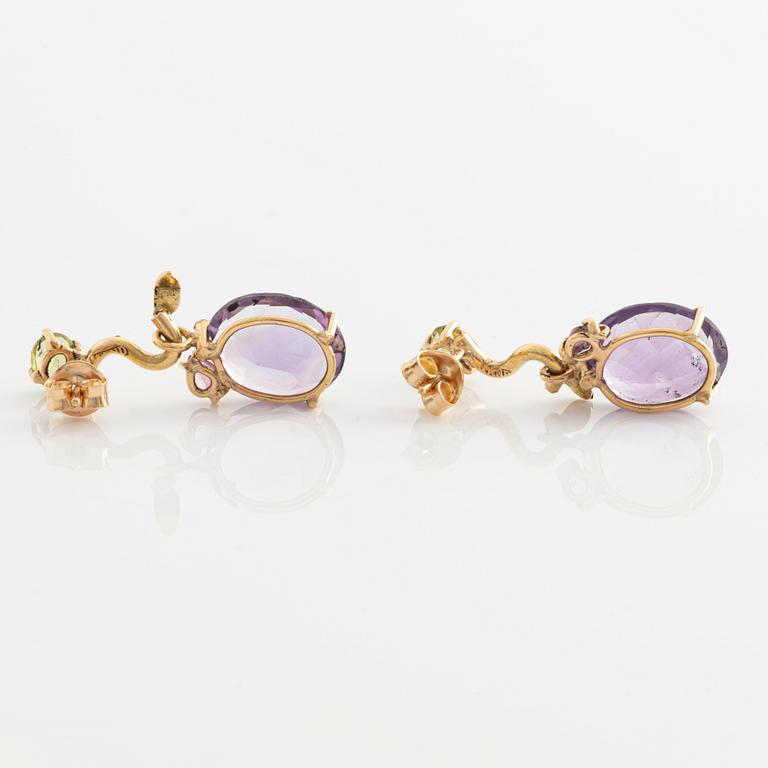 Earrings with oval amethysts, peridot, tourmaline, and small diamonds.