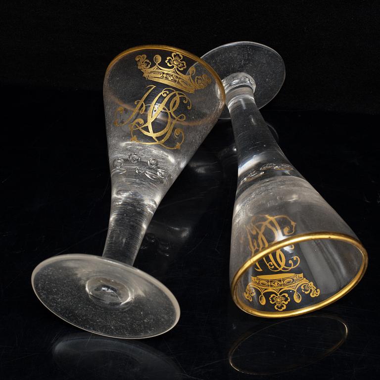 A pair of 18th Century wine glasses.