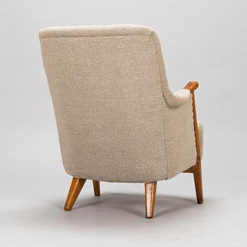 Olof Ottelin, a 1950's 'Pompadour' armchair for Oy Stockmann Ab, Keravan puusepäntehdas.