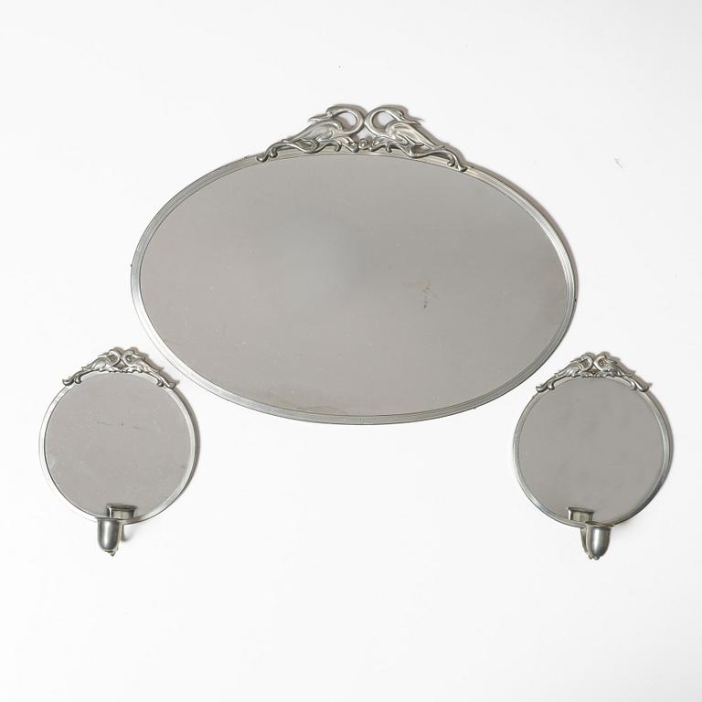 Mirror and mirror sconces, a pair, tin, Sweden, 1920s-30s.