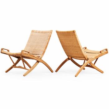 174. Hans J. Wegner, A pair of Hans J Wegner model 512 oak 'Folding Chairs' executed by Johannes Hansen, Denmark 1950's.