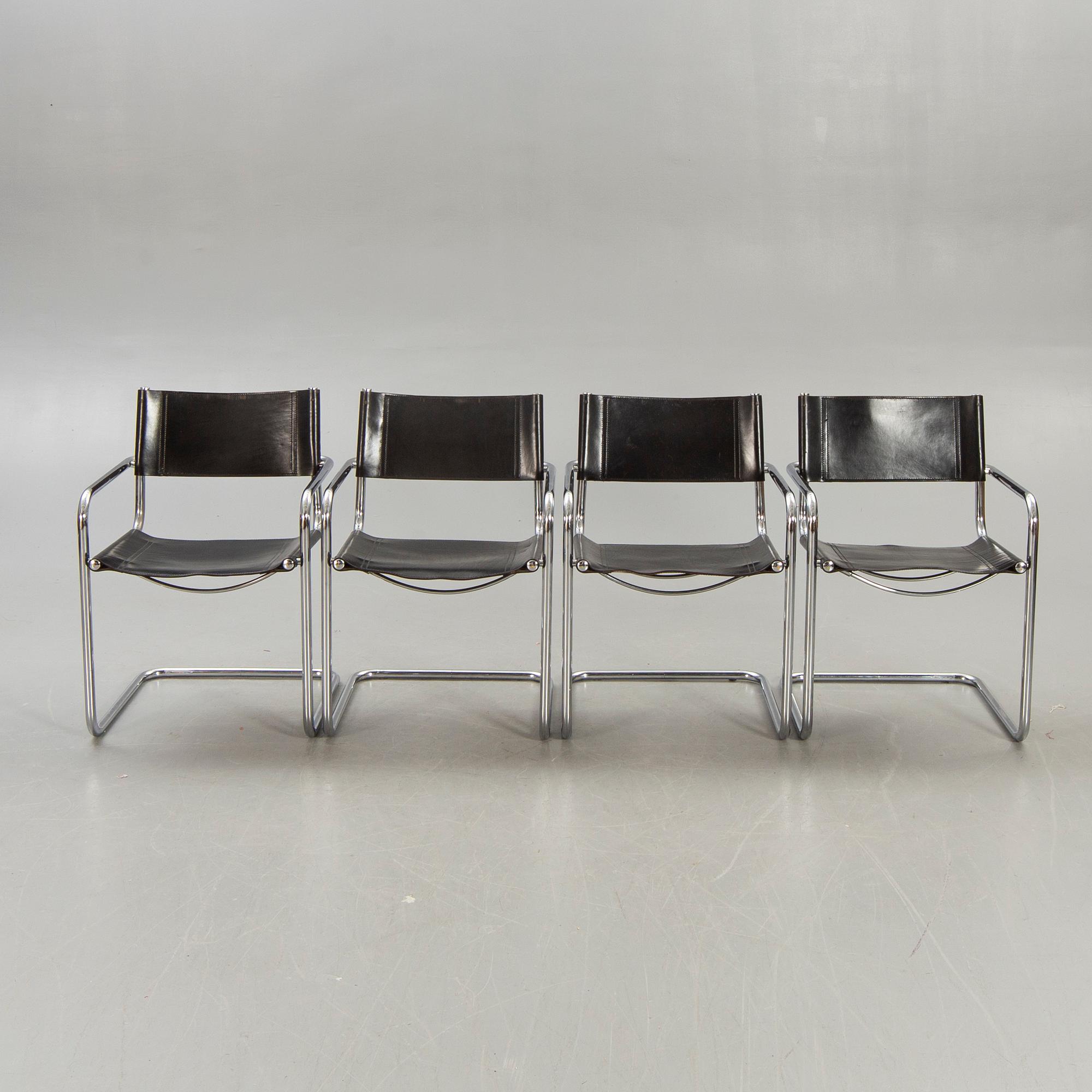 A set of four Italian chrome and leather chairs later part of the 20th century.