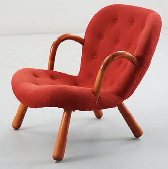 A 1940's-50's 'Clam chair' attributed to Philip Arctander for Möbelstil, Jönköping, Sweden.