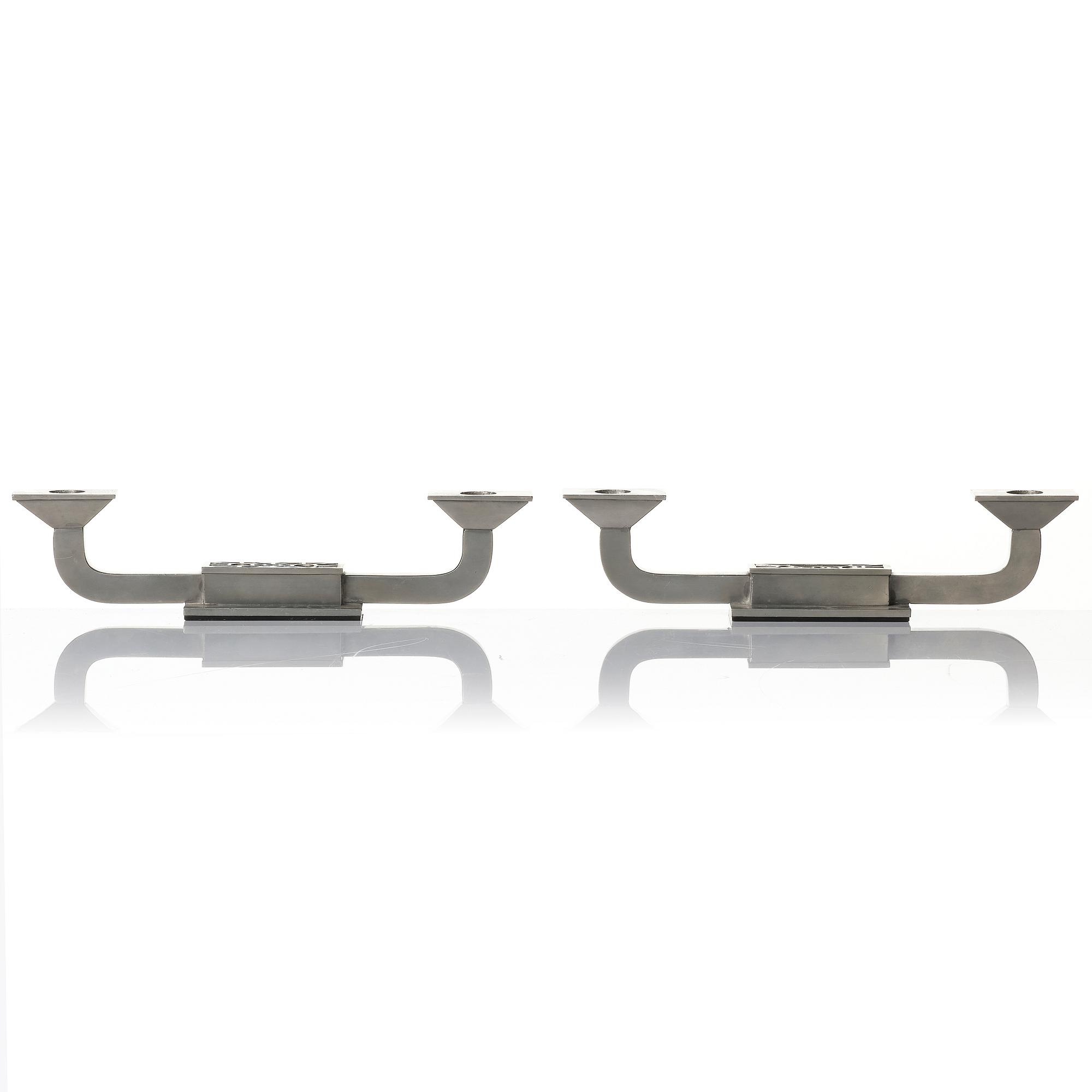 Guldsmedsaktiebolaget (GAB), a pair of candelabra model 117B/1, Stockholm, 1930s.