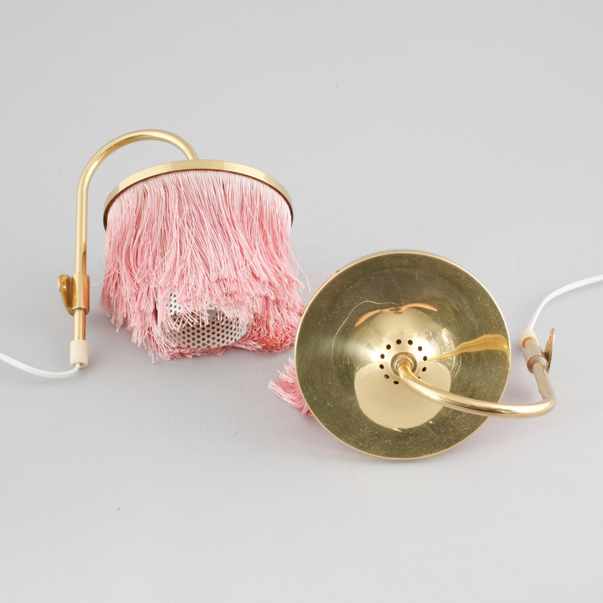 A pair of wall lamps by Hans-Agne Jakobsson for Markaryd from the second half of the 20th century.