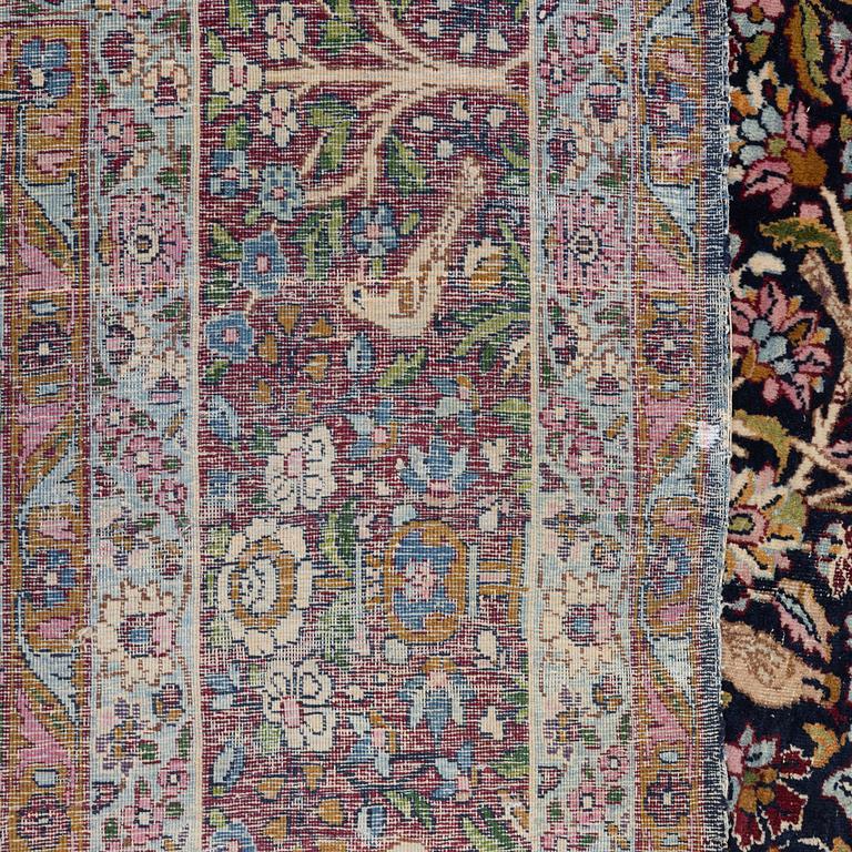 A carpet, Antique/semi-antique Kerman, ca 340 x 220 cm.