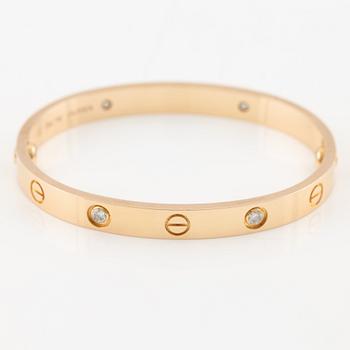 Cartier armband "Love" 18K roséguld med fyra runda briljantslipade diamanter.