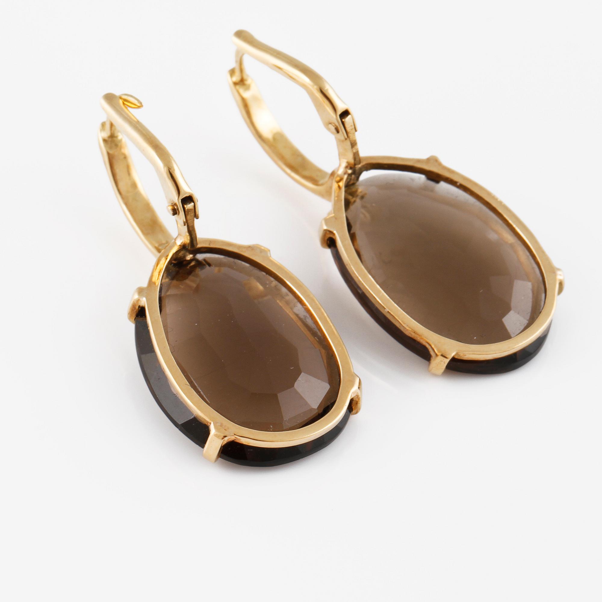 ÖRHÄNGEN, 18K guld med briljantslipade diamanter ca 0.05 ct samt fasettslipad rökkvarts. Vikt 5,3 gram.