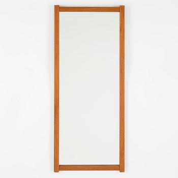 A Swedish teak mirror, Fröseke Nybrofabriken, 1950s / 60s. Signed with label.