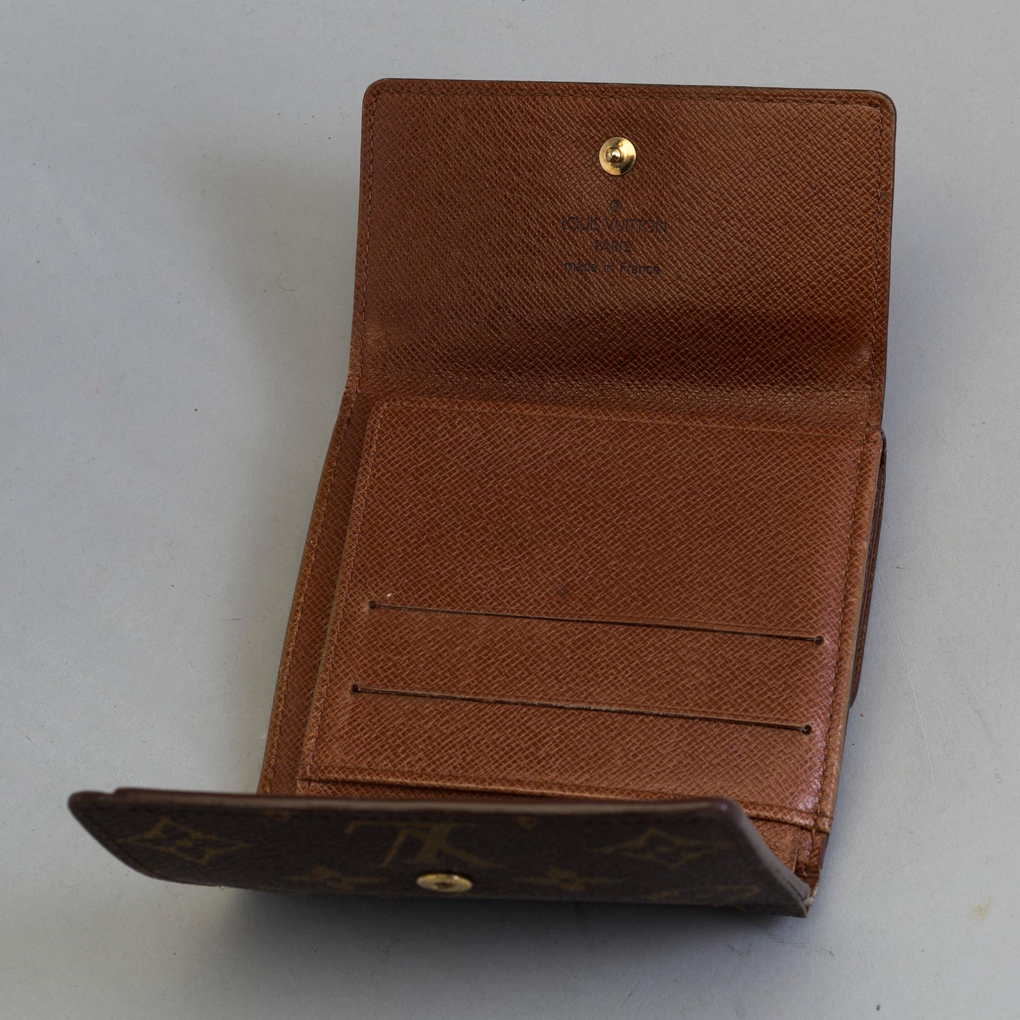 A wallet by Louis Vuitton.