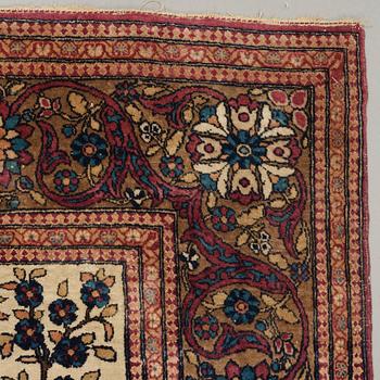 A CARPET, a semi-antique Esfahan figural, 215,5 x 140,5 cm.