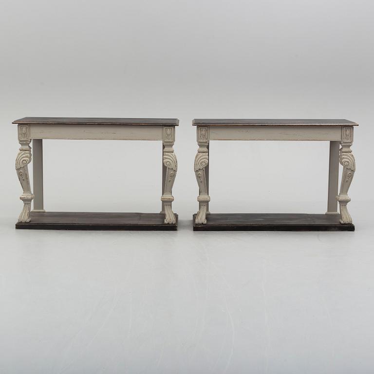 a pair of 20th century console tables.